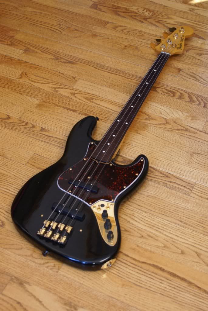 Pictures of black basses with gold hardware?