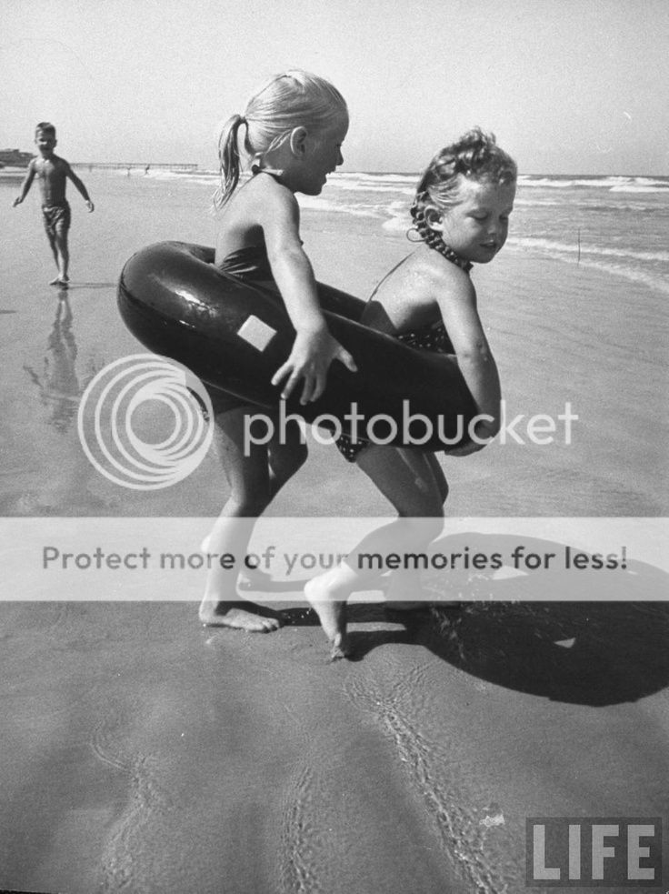 life magazine kids in intertube at beach